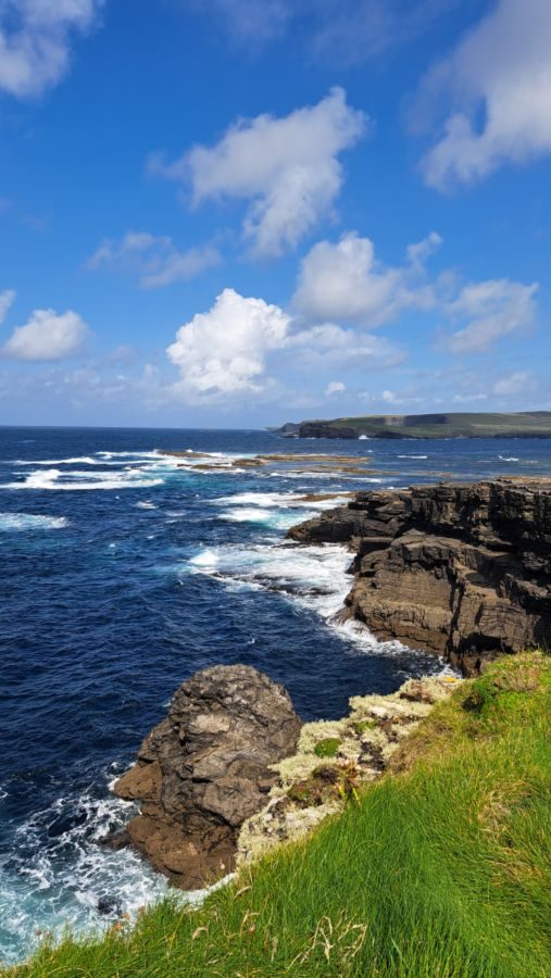 waves at Kilkee Cliffs and waves at Kilkee headland